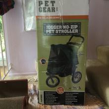 This is the big, fun box that the stroller came in. Meowmuh turned it on its side & we dove in & out of it all day.