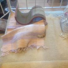 Gracee usually sleeps on TOP of the orange rug but sometimes, she sleeps UNDER it.